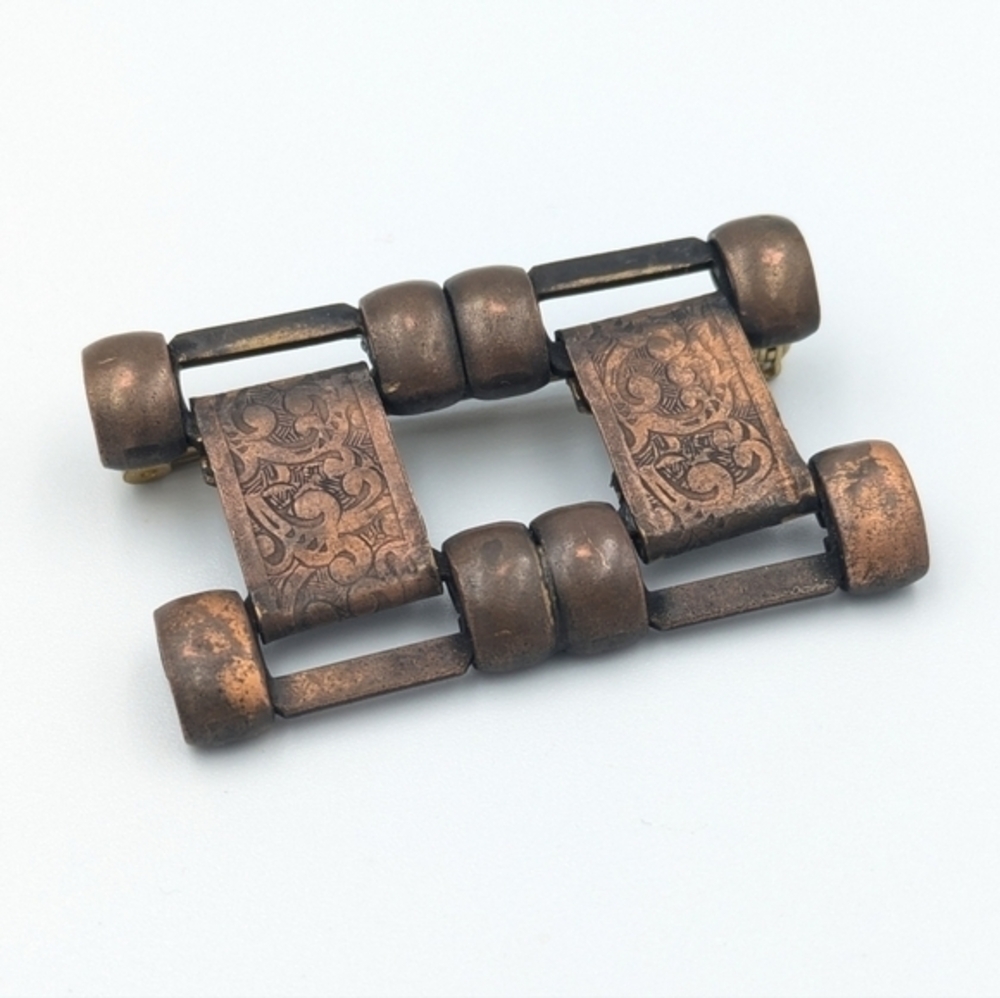 Vintage articulated copper modernist brooch pin